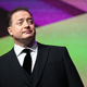 Brendan Fraser in a dark suit
